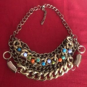 Troy designs multi chain necklace w/ assorted color beads.